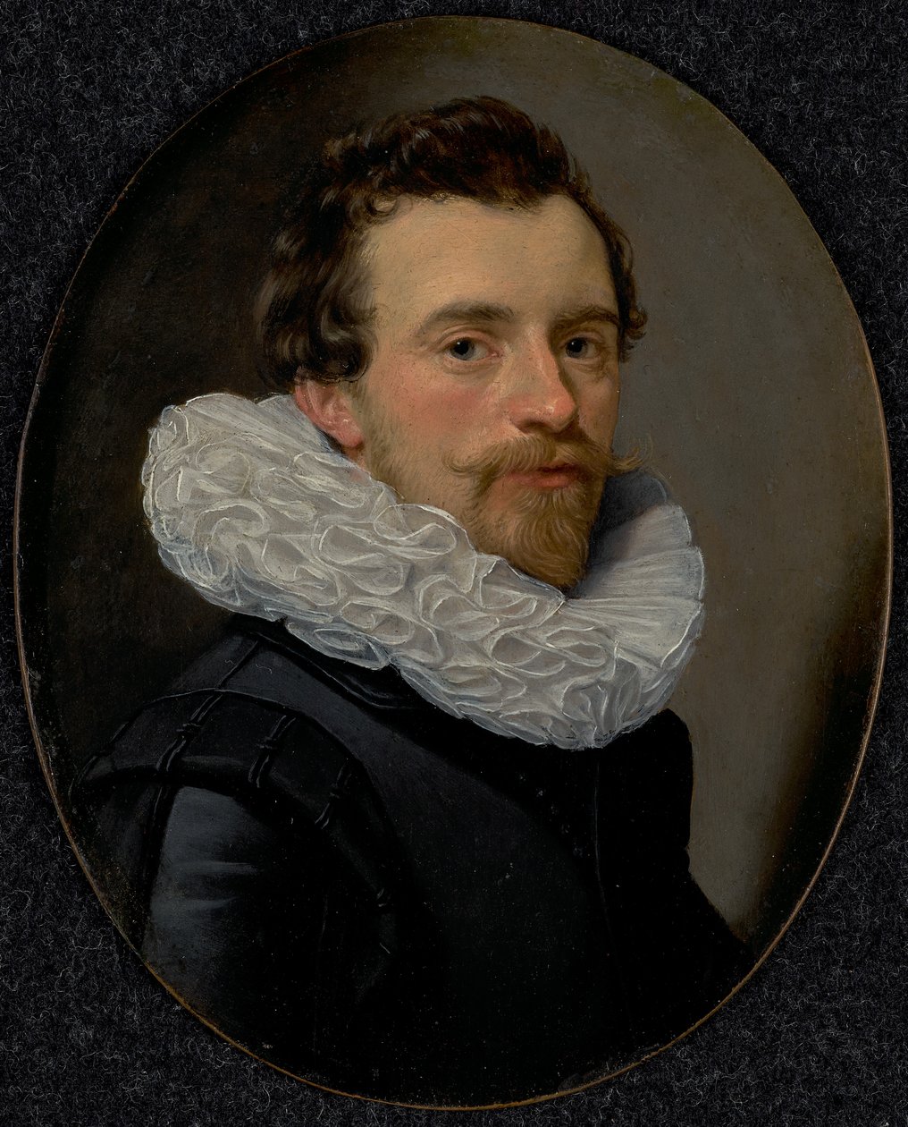 Porträtt av en ung man med en manschett av Thomas Hendricksz. de Keyser