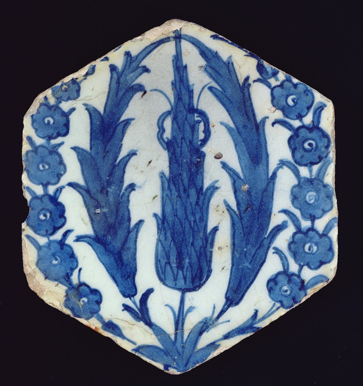 Sexkantig Isnik-platta med cypresser och en prunus, 1560-70 (lergods med färgad underglasyr) av Turkish School