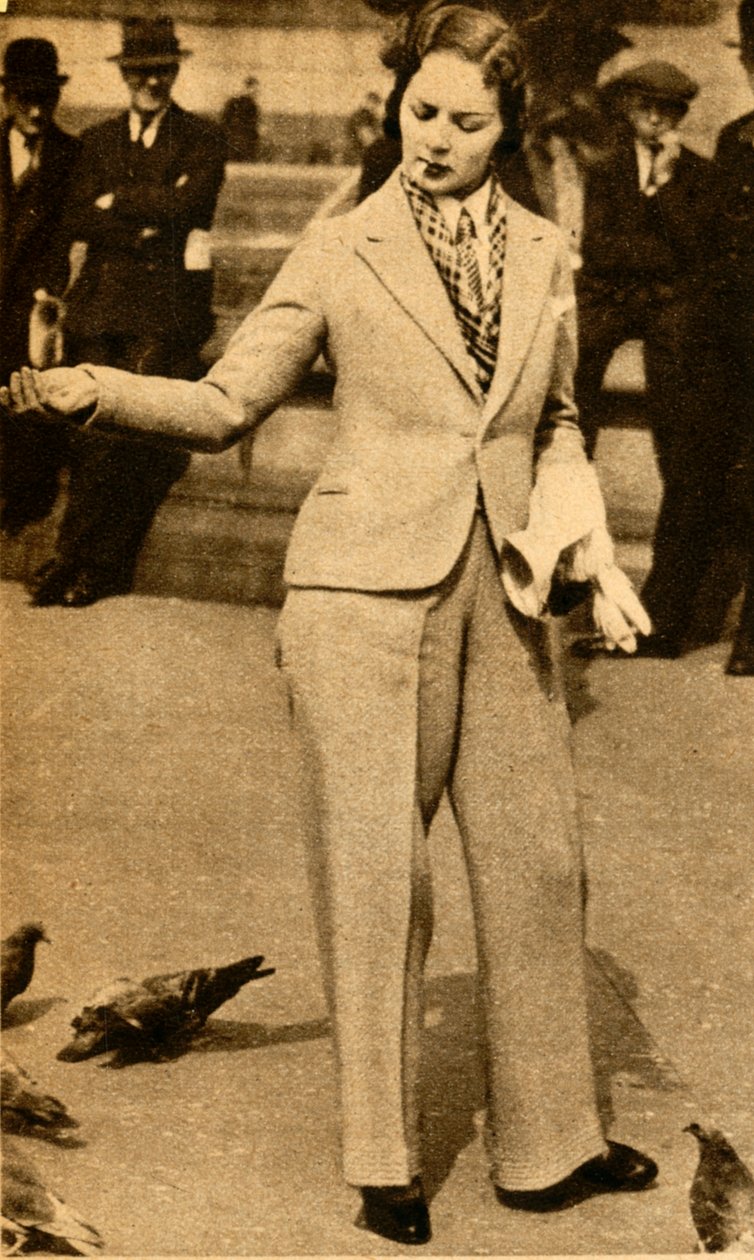 En besviken dam som matar duvor på Trafalgar Square, 1933. av Unbekannt