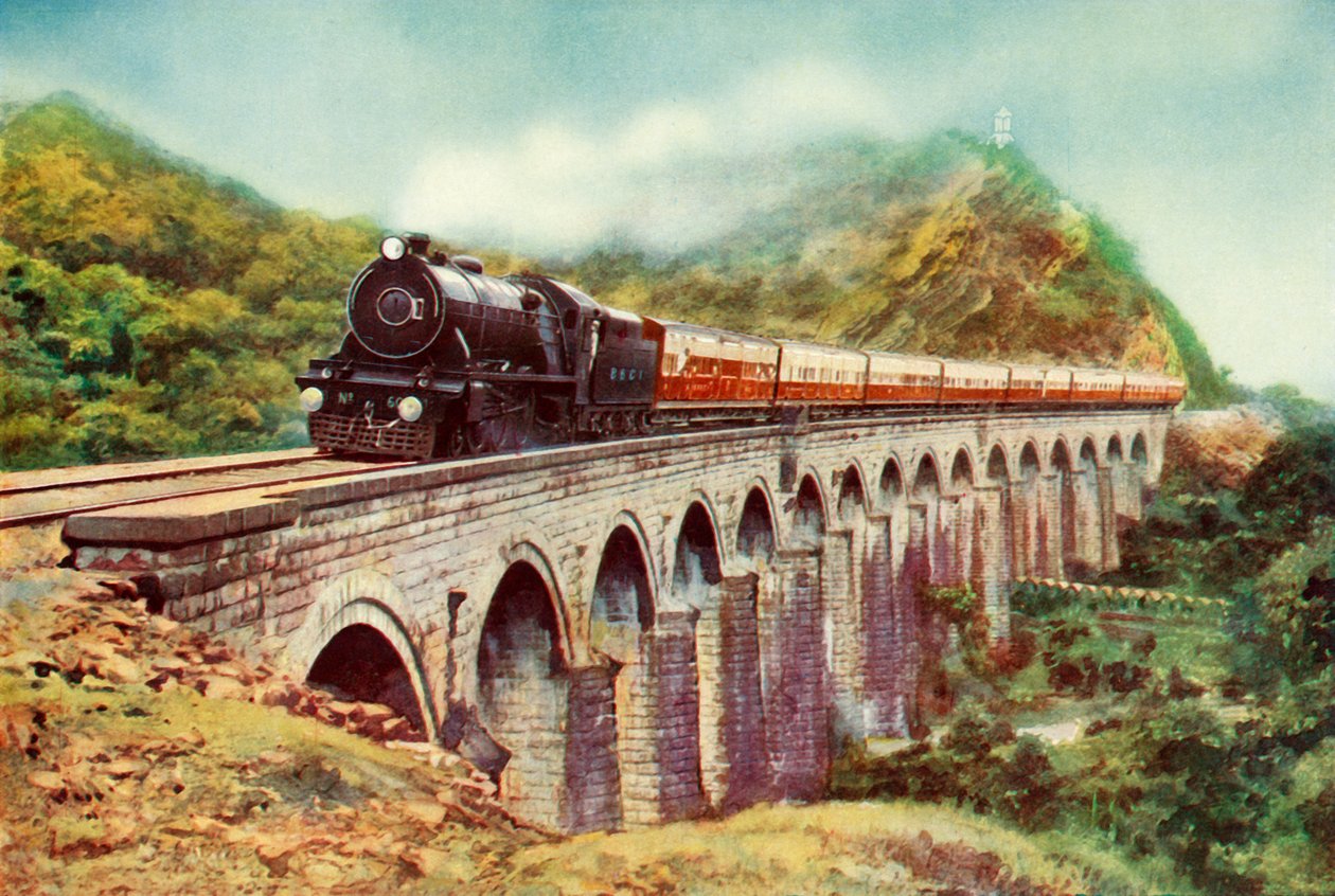 Mellan Bombay och Delhi. En slående vy av Frontier Mail som passerar över en viadukt, 1935 av Unbekannt