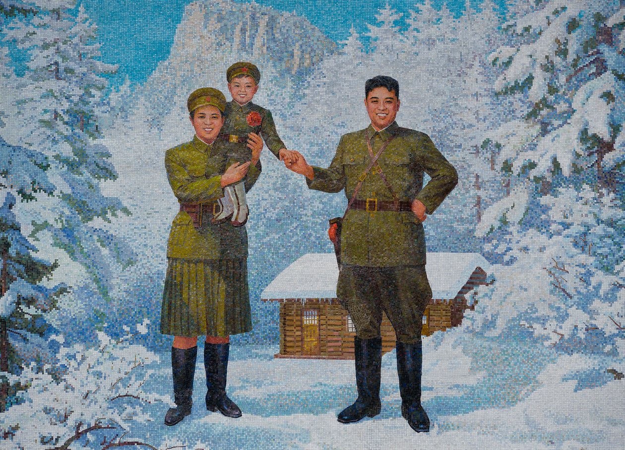 Glad familj. Kim Il-sung och hans fru Kim Jong-suk med sonen Kim Jong-Il, 1960-talet av Unbekannt