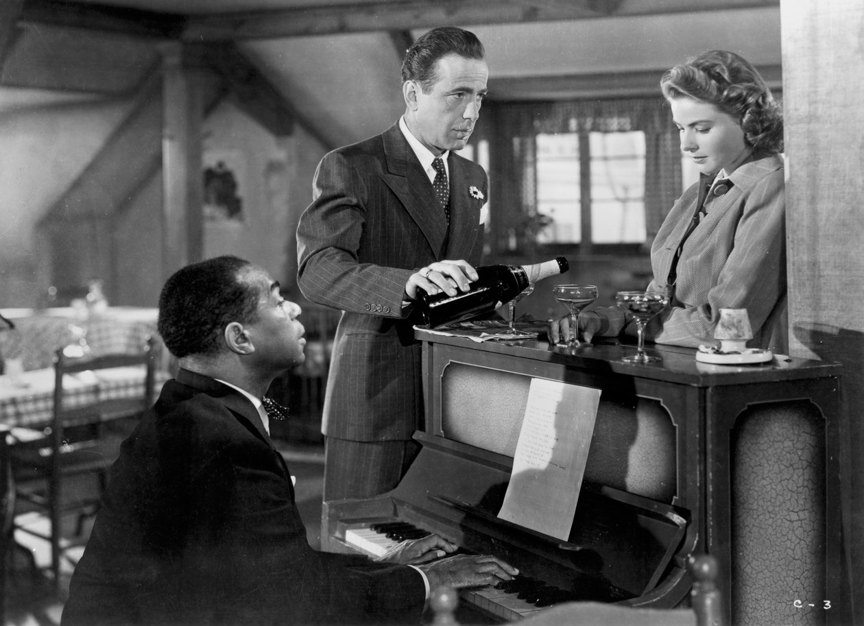 Ingrid Bergman, Humphrey Bogart och Louis Armstrong i Casablanca, 1942 av Unbekannt