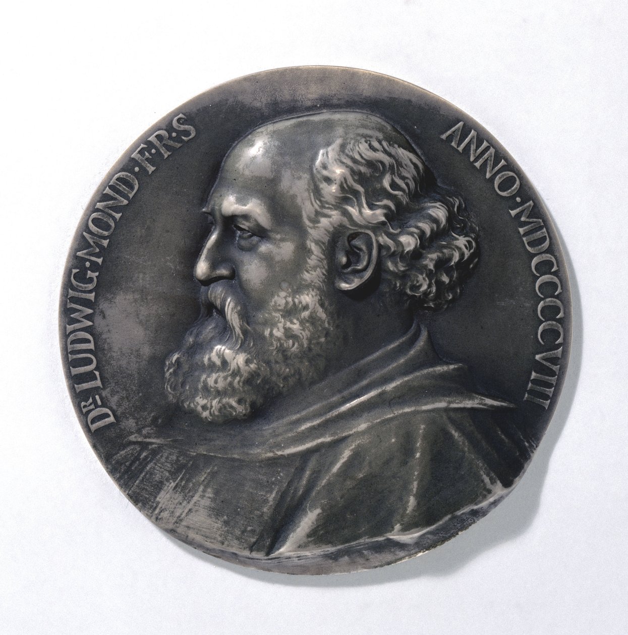 Medalj föreställande Ludwig Mond, industrikemist av Unbekannt