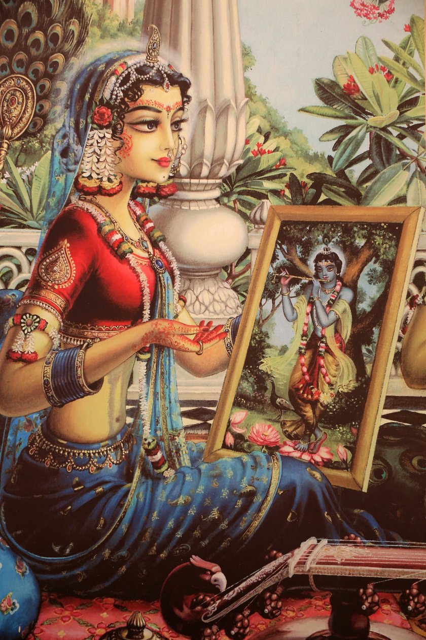 Målning föreställande Radha tittar på en bild av Krishna. Indien av Unbekannt