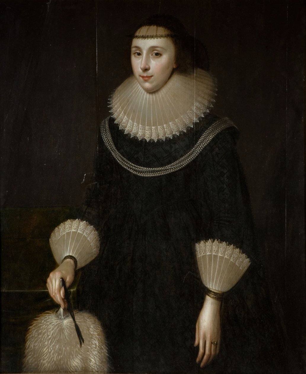 Porträtt av en dam med en fläkt, 1600-1650. av Unbekannt
