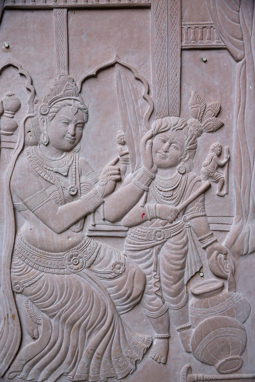 Relief som visar den hinduiska guden Krishna med sin styvmor Yashodha. Indien av Unbekannt