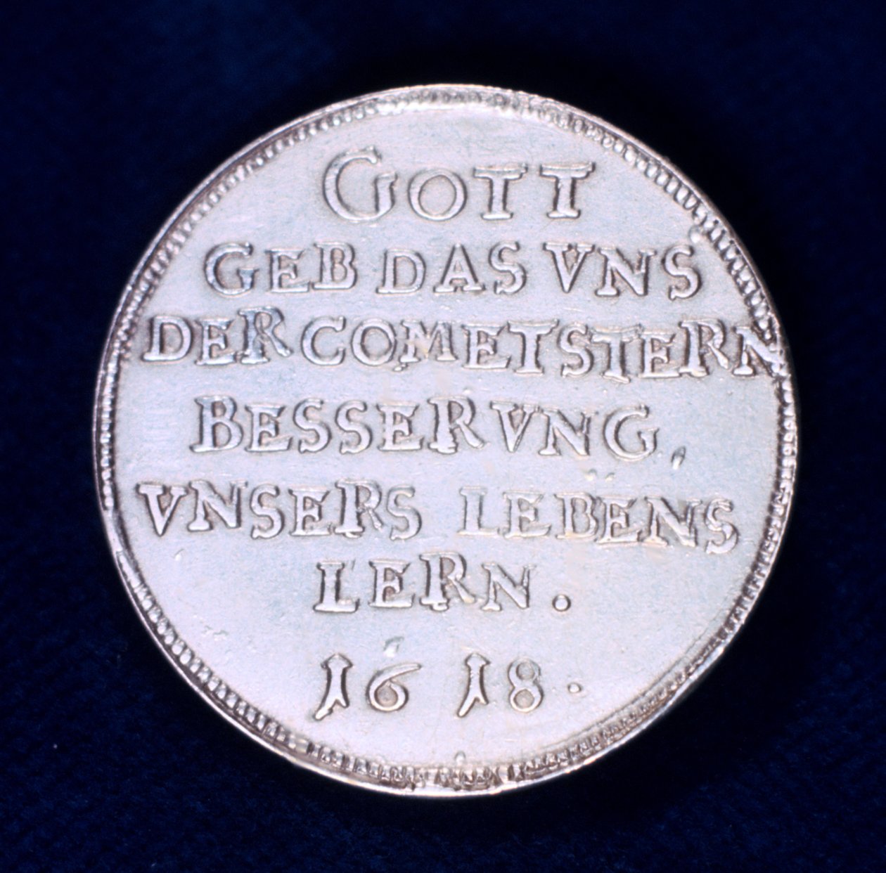 Baksidan av en medalj till minne av den briljanta kometen från november 1618 av Unbekannt