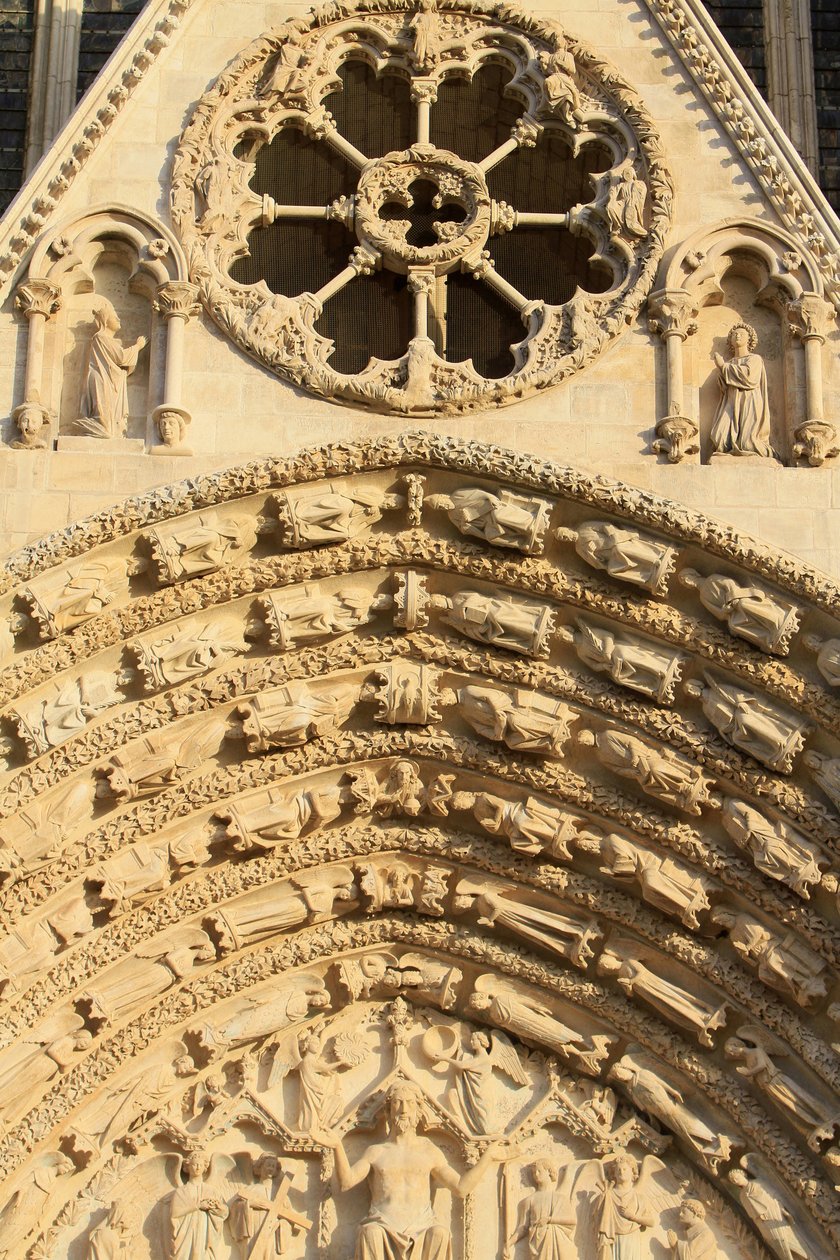 Rose fönster. Tympanum i den västra centralportalen. Stefansdomen. av Unbekannt