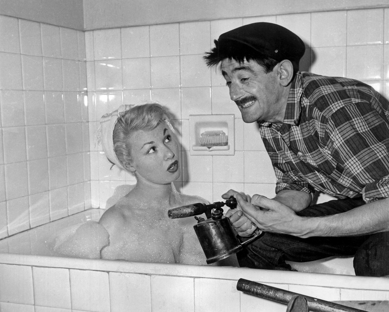 Nadine Tallier (blev friherrinnan Nadine De Rothschild) och Maurice Gardett under Soiree Chez Lui i Paris den 27 mars 1961 av Unbekannt Unbekannt