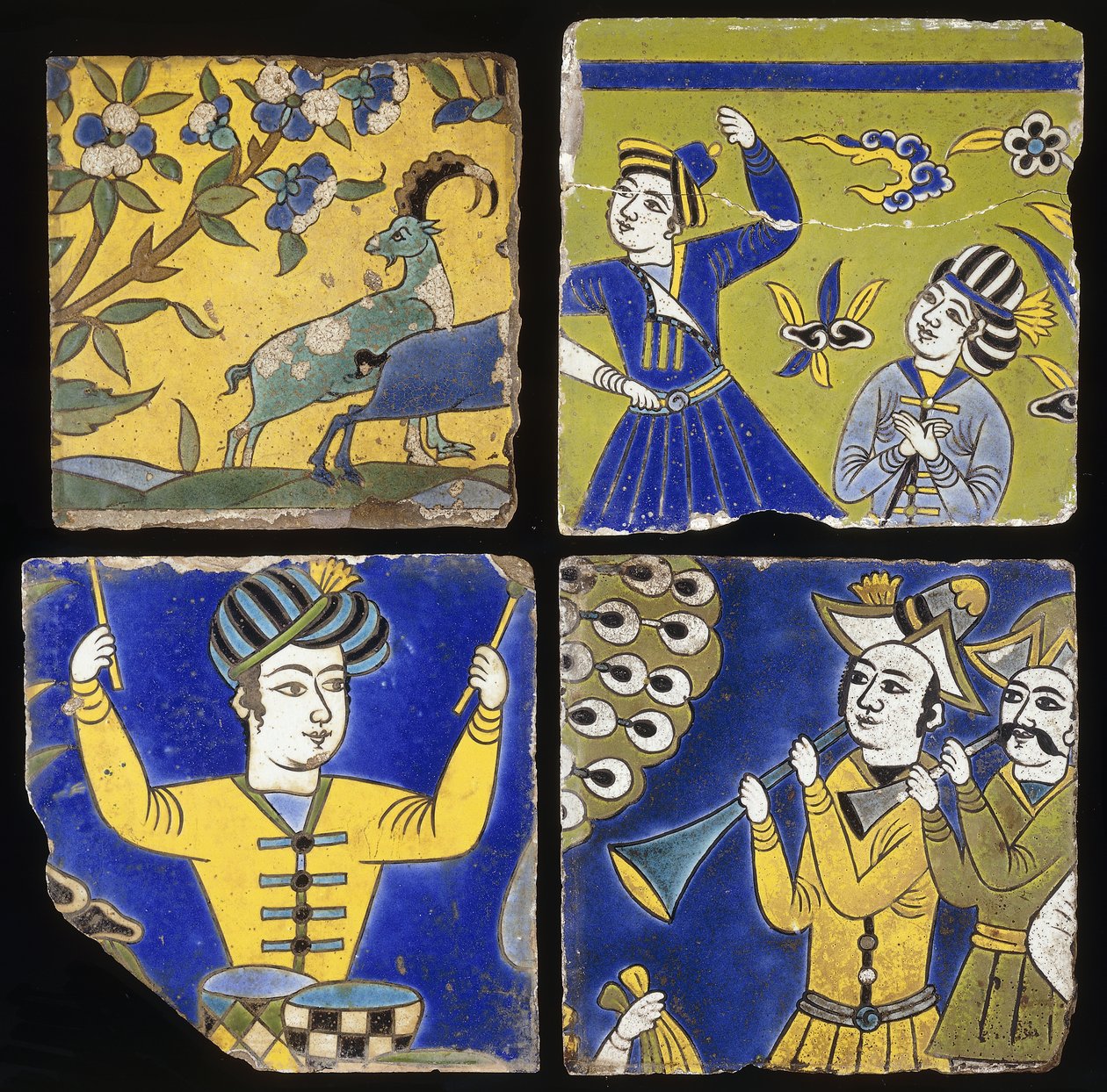 Fyra Safavid cuerda seca brickor, föreställande två stenbockar, och figurer av musiker och dansare, ca. 1600 av Unbekannt
