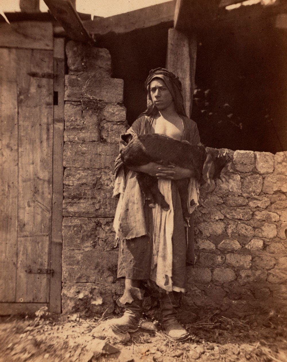 Libanons pater med ett barn. Fotografi av Charles Lallemand (1826-1904) i "Syria, costumes, voyages and landscapes". 1865. Privat samling. av Unbekannter Künstler