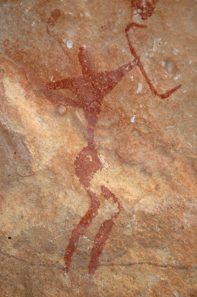 Bergkonst, förhistoria: Målning av en karaktär (bågskytt) i ett utsmyckat skydd, i Uweinat-massivet, Sudan (Karkur-Talh eller Karkur Talh). Period från 8000 till 3000 år f.Kr. Fotografi av Unbekannt