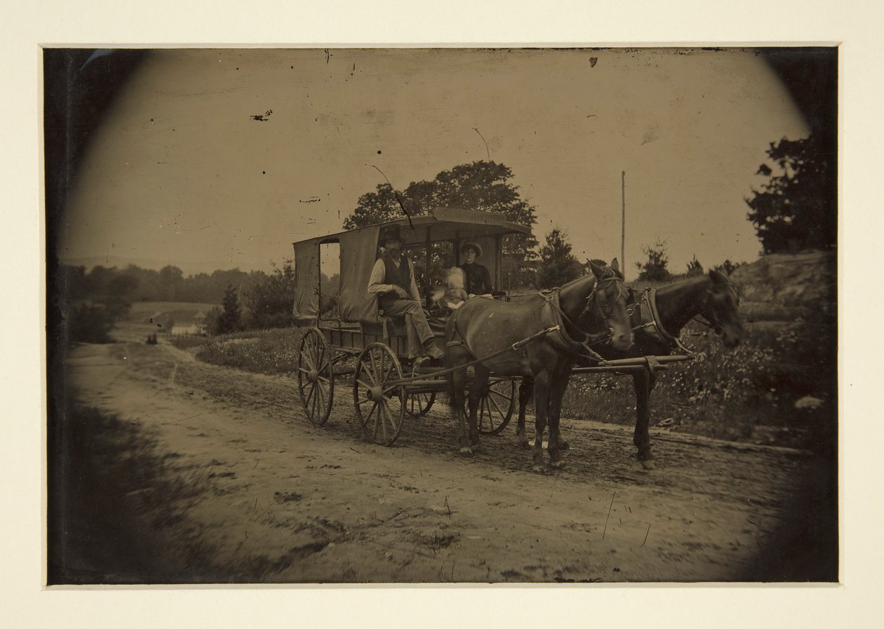 Familj i en vagn av Unknown
