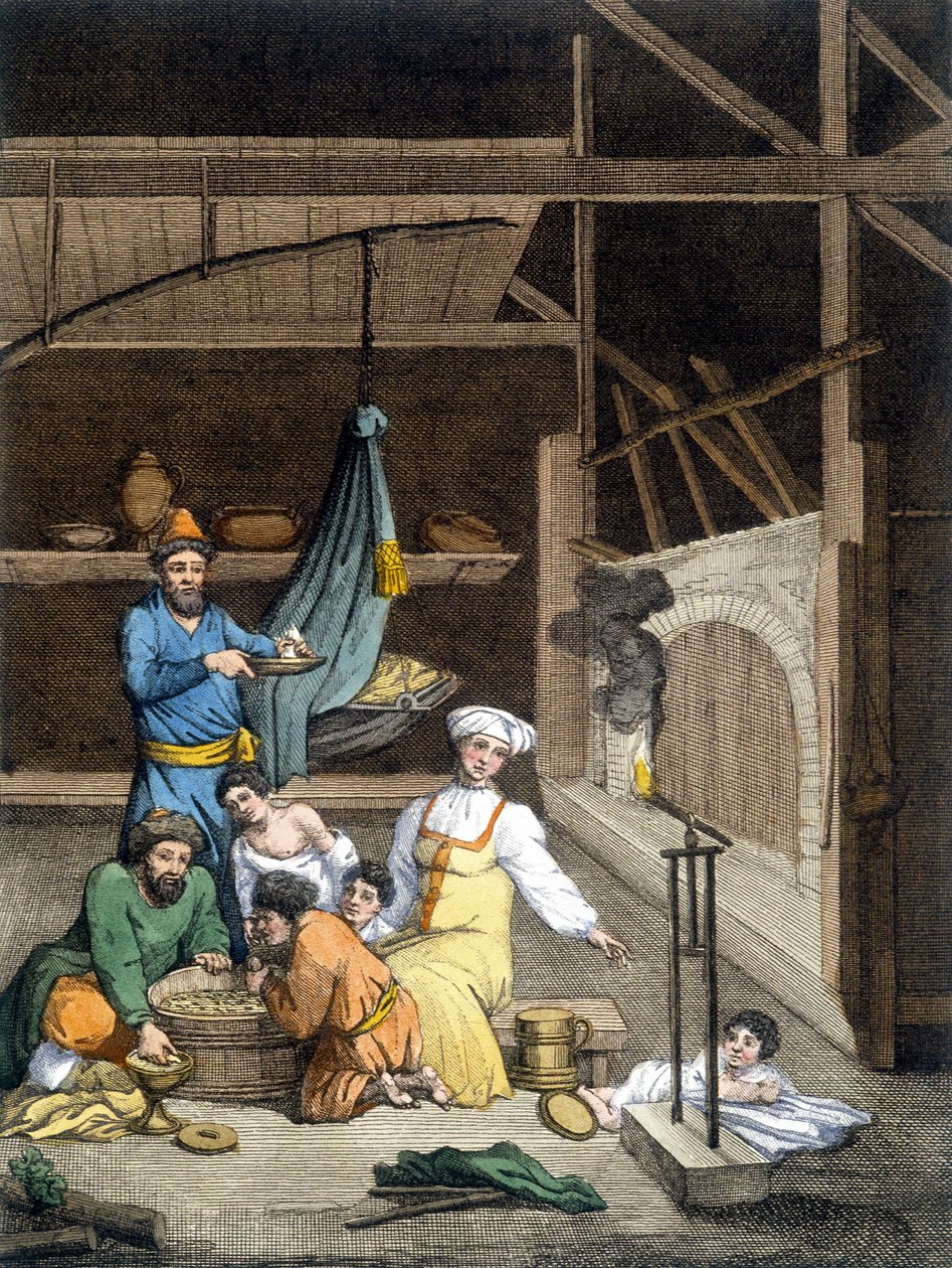 Inne i ett ryskt hus, en familj vid lunchtid. av Unknown artist