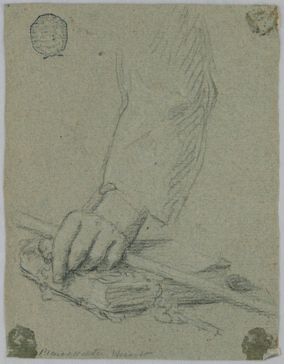 Studie: vänster hand av en ung man som håller en pinne och vilar på en bok av Unknown artist