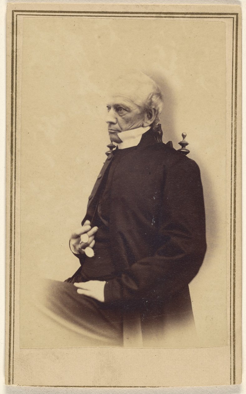 [Oidentifierad skallig äldre man sittande, håller i en pince-nez] av Unknown artist