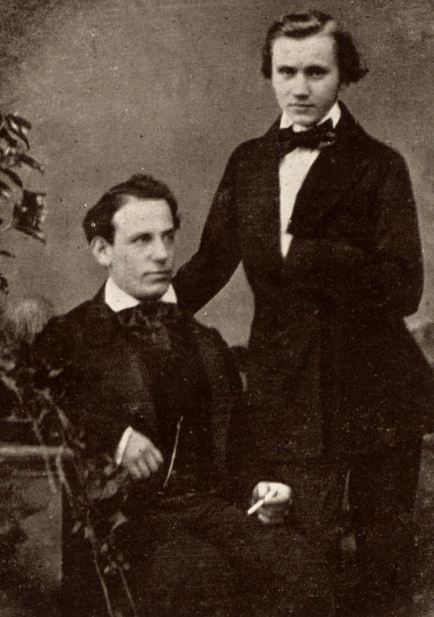 Johannes Brahms (1833-1897), tysk kompositör, stående, med den ungerske flyktingviolinisten Eduard Remenyi (1828-1898), som han turnerade med (raster från ett fotografi) av Unknown photographer