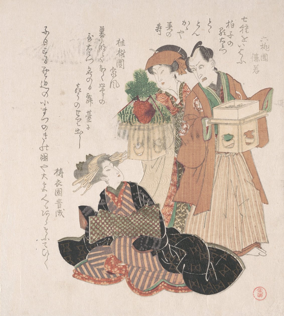 Skådespelaren Nakamura Utaemon med två kvinnor som förbereder sig för nyårsceremonin, 1800-talet. av Utagawa Toyokuni I