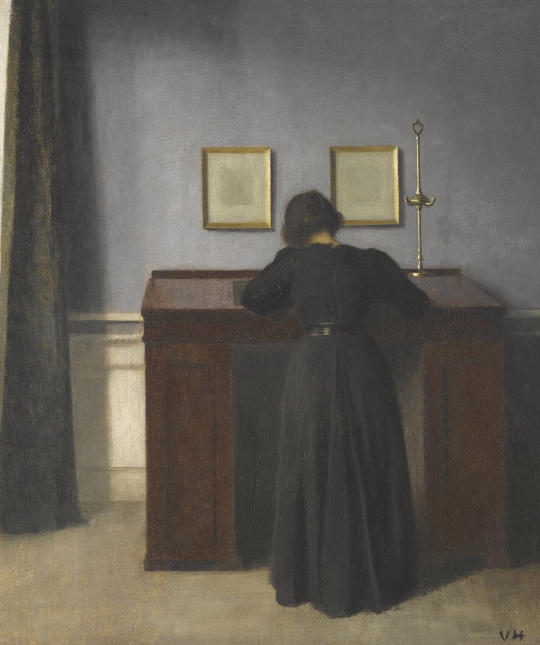 Ida står vid ett skrivbord av Vilhelm Hammershøi