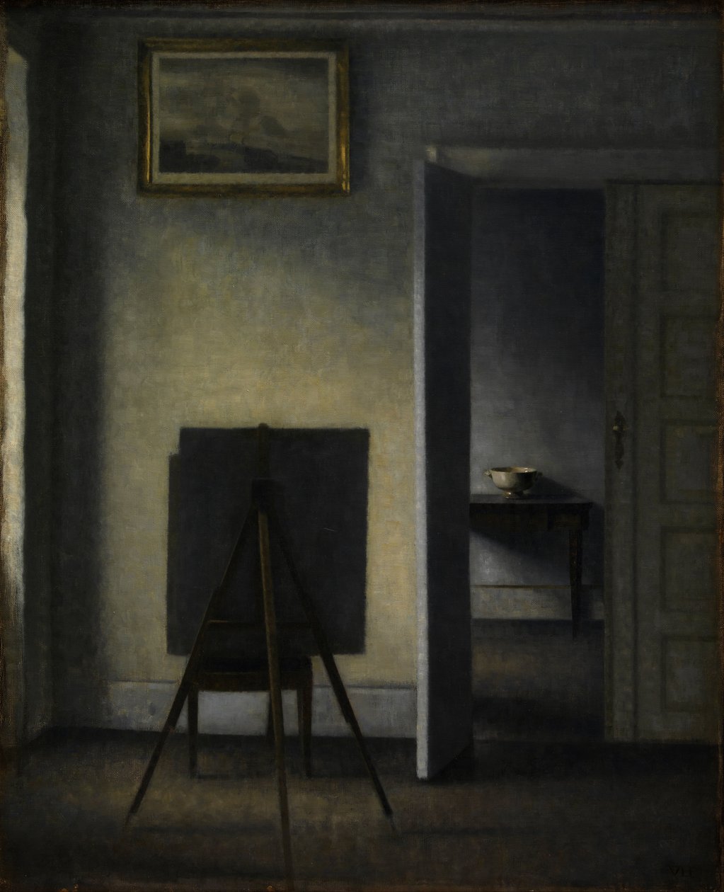 Interiör med konstnärens staffli, 1910. av Vilhelm Hammershøi