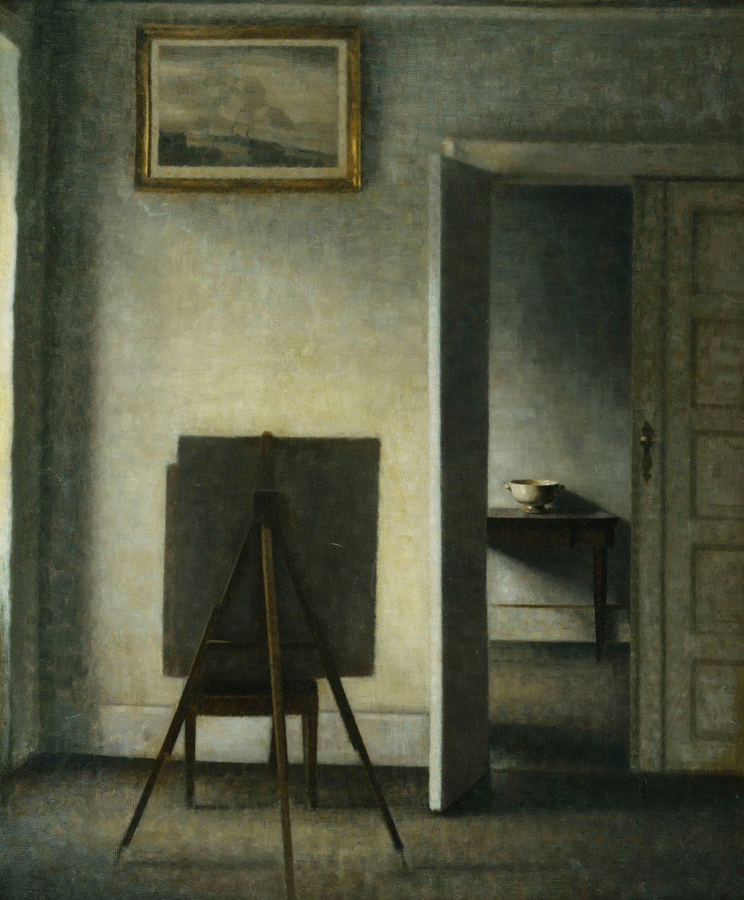 En interiör med konstnärens staffli, av Vilhelm Hammershoi