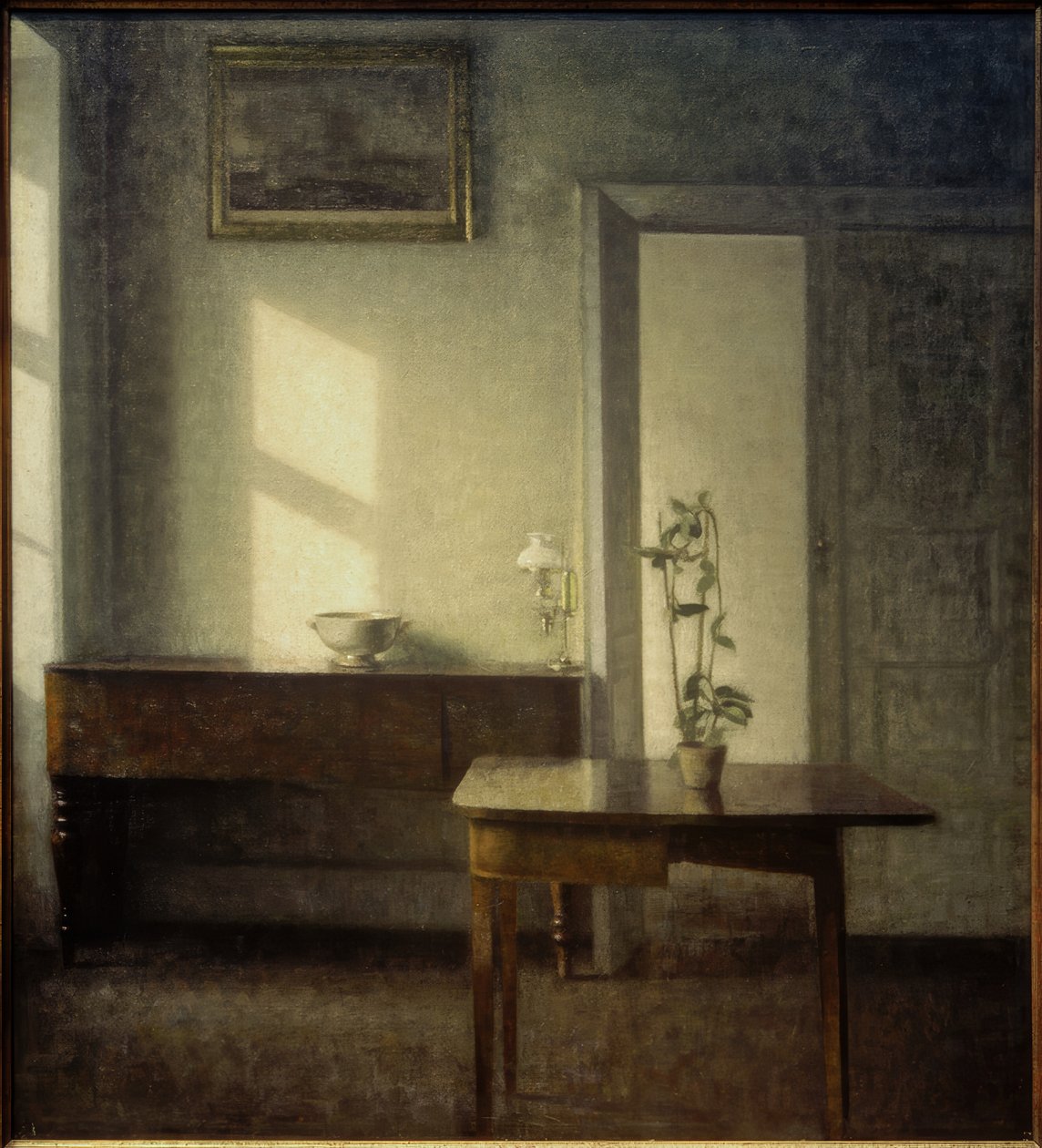 Interiör med krukväxt av Vilhelm Hammershoi