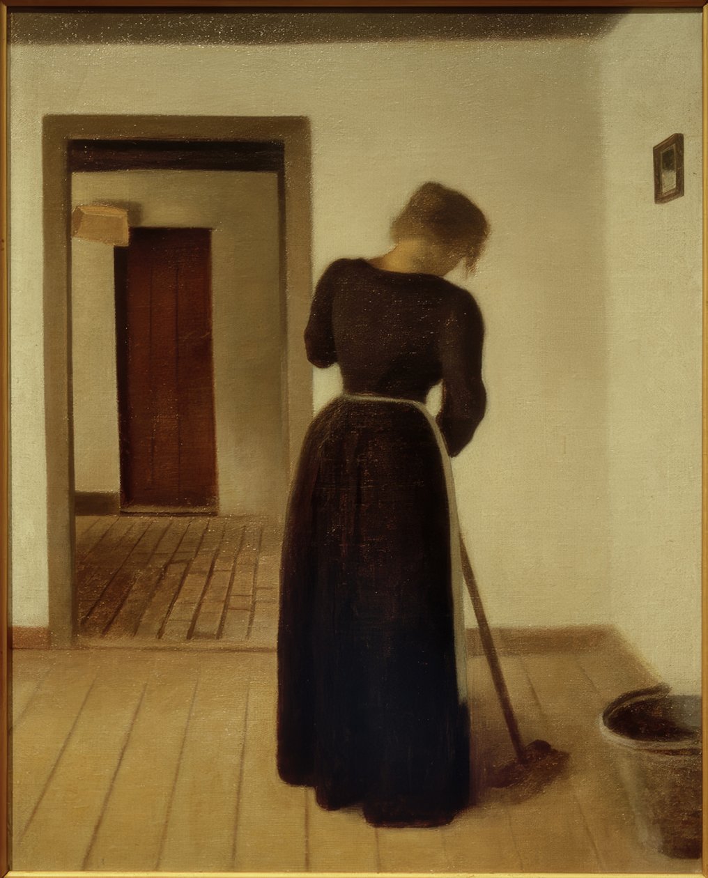 Interiör med en ung kvinna som sopar av Vilhelm Hammershoi