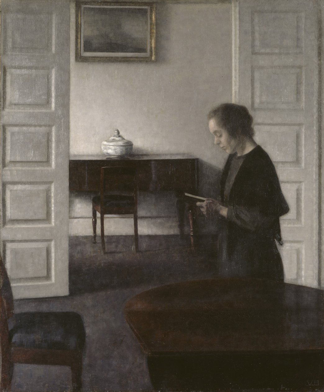 Interiör med en Lady Reading, ca 1900 (olja på duk) av Vilhelm Hammershoi
