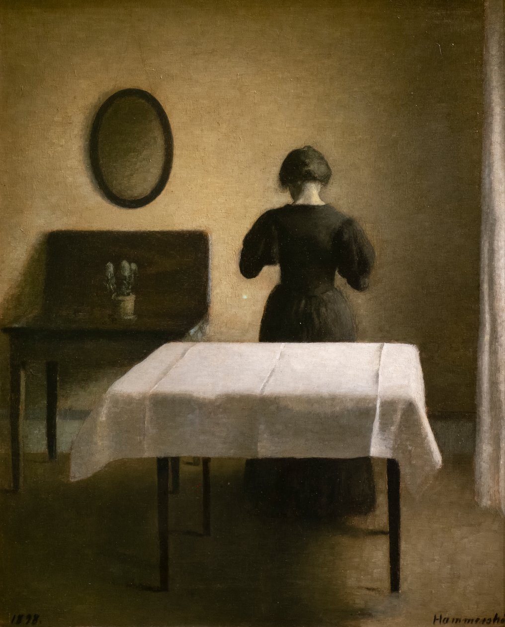Interiör med en rygg kvinna av Vilhelm Hammershoi