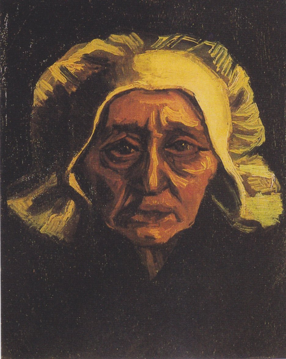 Huvud för en gammal bondekvinna med en vit huva av Vincent van Gogh