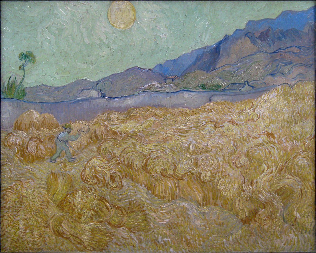 Korenveld met maaier av Vincent van Gogh