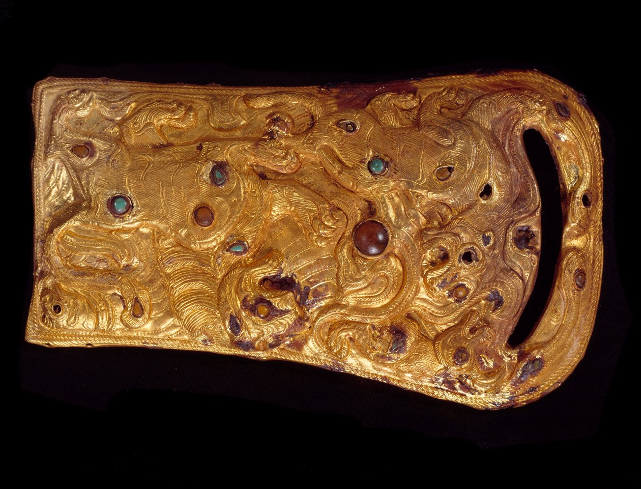 Kinesisk konst: bältesspänne i guld med ädelstenar. Västra Handynastin (206 f.Kr.-25 e.Kr.). Paris, Cernuschi-museet av Western Han Dynasty Chinese School