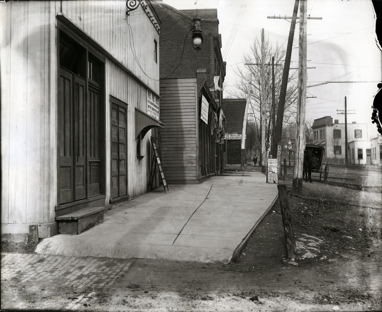 Horizontal, black and white photograph of Dieckman Wagon Manufacturing is at left in the distance at 8301 Halls Ferry av William G. Swekosky