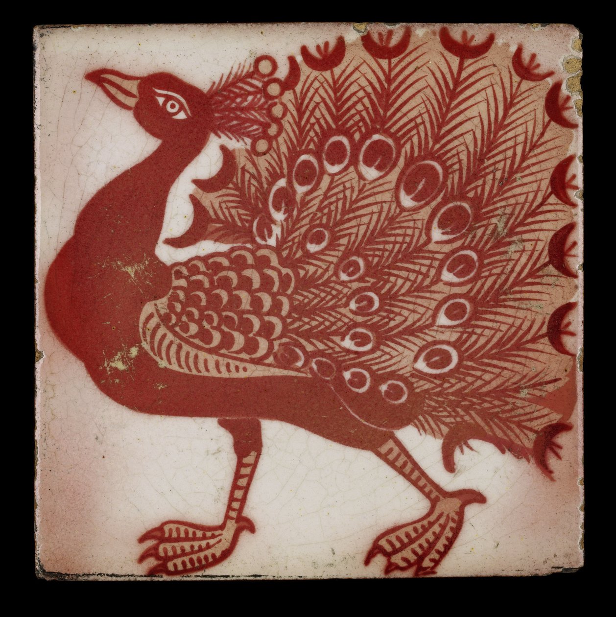 Kakel med påfågel (röd och vit glans) av William de Morgan