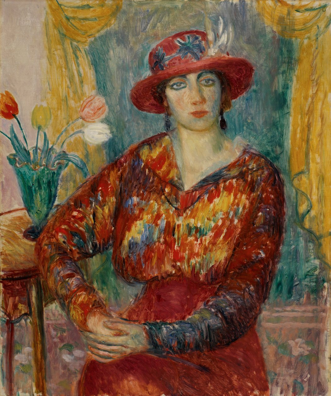 Kvinna i röd blus med tulpaner av William James Glackens