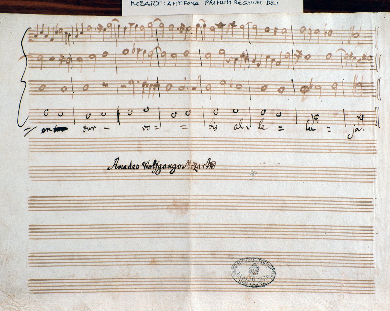 Sida med kompositörens signatur Querite för första gången i Guds rike av Mozart för att få titeln Accademico filarmonico (1770) av Wolfgang Amadeus Mozart