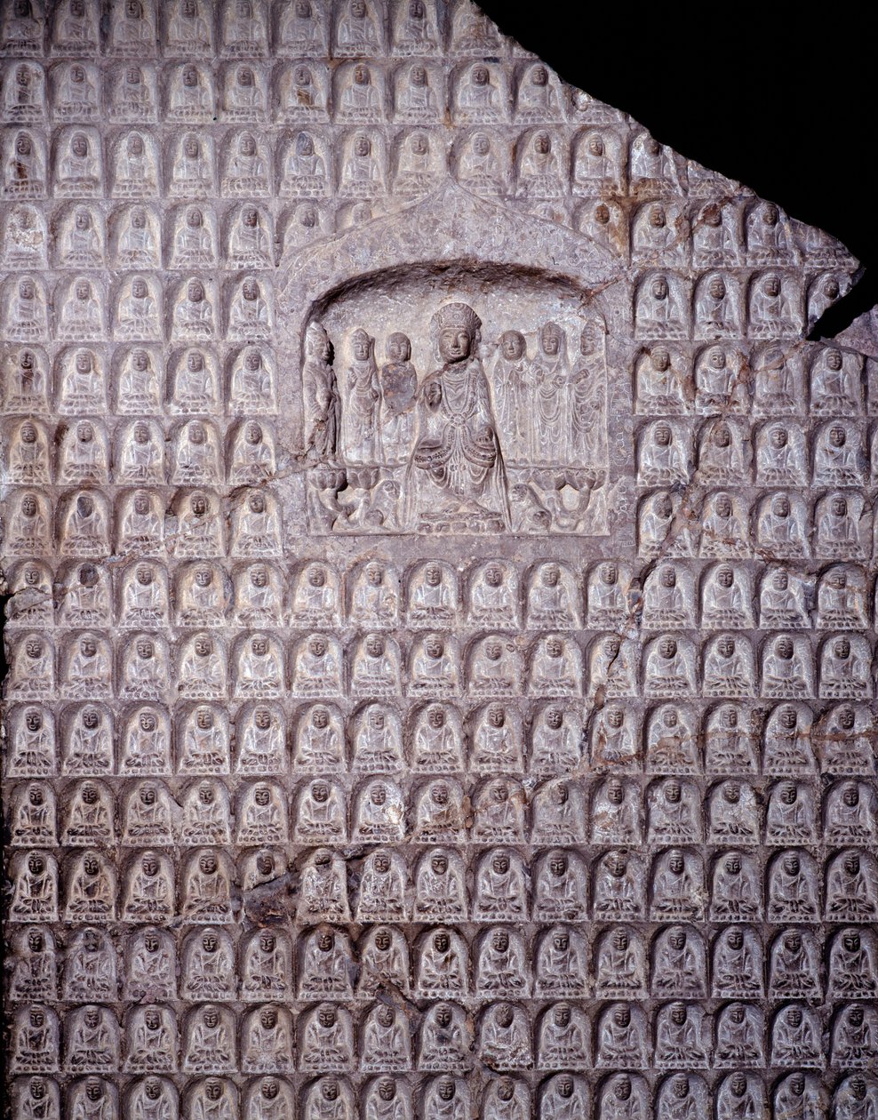 Kinesisk konst: stelen av de tusen Buddhas. Period av Zhoudynastin (Cheou). 11-3:e århundradet f.Kr. Shanghai. Shanghai Museum av Zhou Dynasty Chinese School