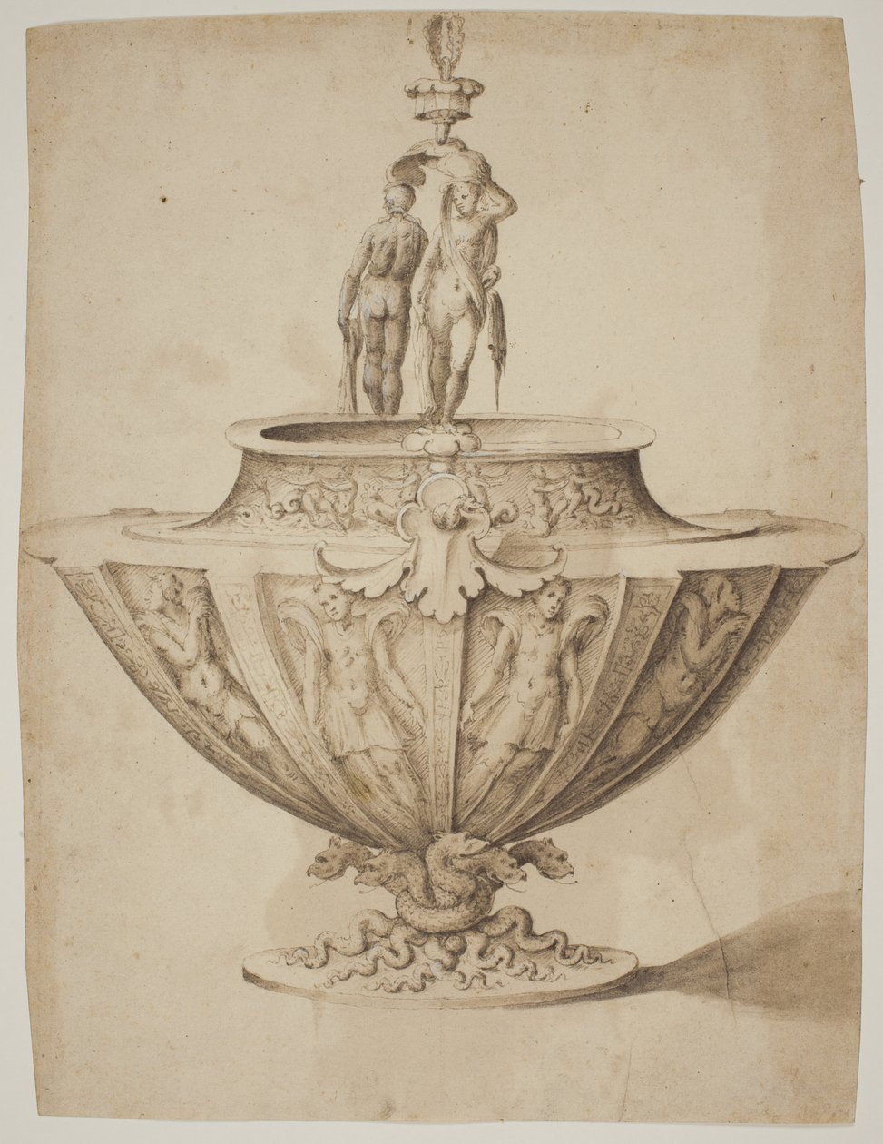 En magnifik skål med figurer och marina scener på en bas omgiven av ormar av after Giulio Romano