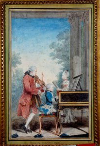 Wolfgang Amadeus Mozart (1756-1791) som barn spelade piano med sin far och syster