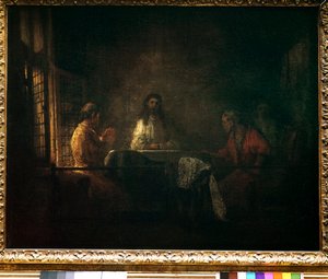 Emmaus Kristi pilgrimer visar sig för pilgrimerna som sitter vid ett bord på ett värdshus i Emmaus. Målning av verkstaden av Harmensz van Rijn dit Rembrandt (1606-1669)