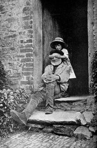 Ett barn med sin farfar, England, c1922.