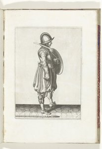Sköld- och spikövningen: Soldaten med skölden redo och spiken på marken bredvid sin högra fot (nr 17), 1618 Nassausche Wapen-Handelinge, van Schilt, Spies, Rappier and the Targe: beyde figuerlick avbildad, slut inramad efter den nya