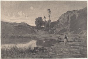 En ryttare vid en bergsdamm i solnedgången