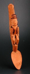 Figur av en europeisk man sittande på skaftet av en sked, Sydöstra Afrika, sent 1800-tal (trä) av African