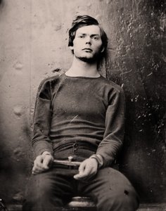 Lewis Powell i handledsjärn ombord på USS Saugus, 1865