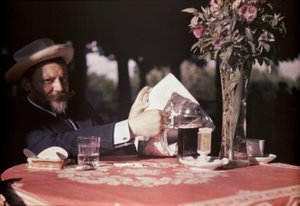 Frank Eugene sitter vid bordet av Alfred Stieglitz