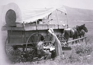 Typisk pionjärklädd vagn (s/v foto) av American Photographer