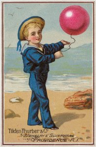 Sailor Boy håller röd ballong av American School