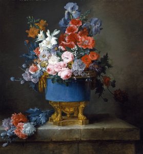 Bukett blommor i en blå porslinsvas