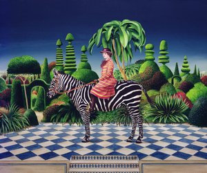 Dam på en zebra